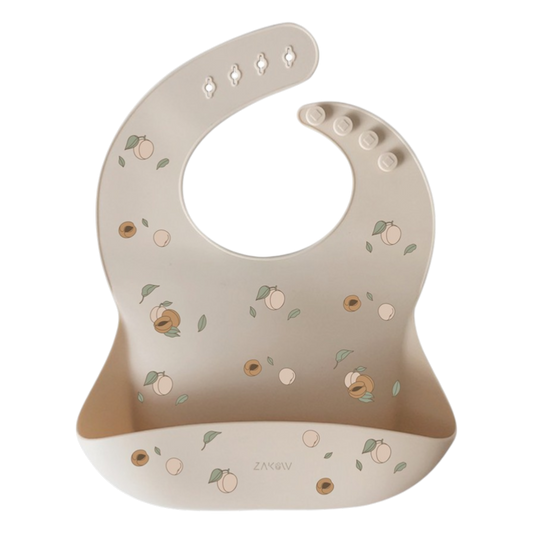 Bavoir en silicone souple beige avec motifs et attache ajustable pour bébé - Zakuw